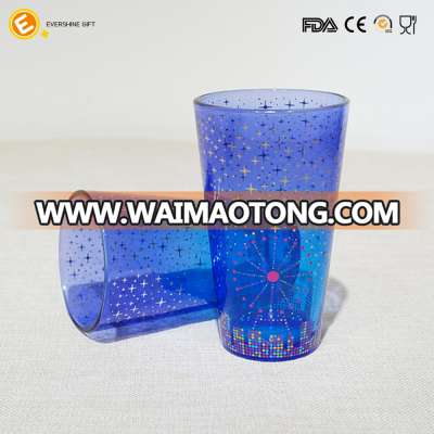 Blue 16oz pint beer glass outside spraying